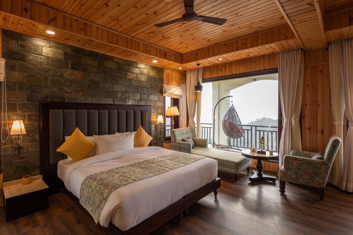 Experience ultimate luxury at Buransh Retreat in Ojaswi Resort, featuring sweeping 180-degree Himalayan views.