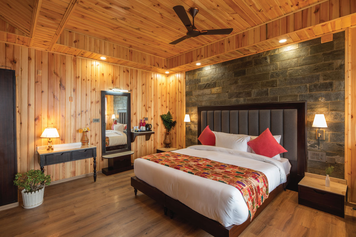 Executive Jacuzzi Room at Ojaswi Resort Mukteshwar, featuring a private garden sit-out and luxury amenities.