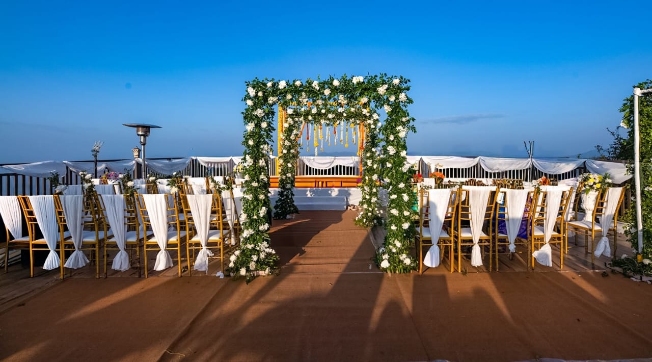 Destination wedding at Ojaswi Himalayan Resort Mukteshwar with couple against scenic Himalayan backdrop